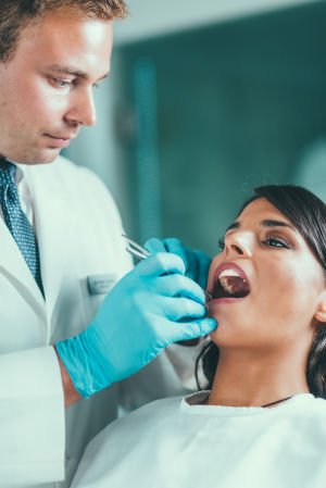 Patient getting a composite dental fillings in Chelsea MA